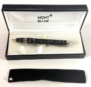 Montblanc, a Starwalker ballpoint pen set with a floating white Montblanc emblem