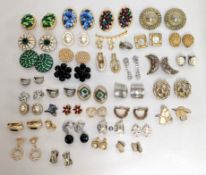 A large collection of costume jewellery clip on earrings including various styles.