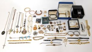 A large quantity of costume jewellery, some silver jewellery and fashion watches