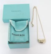 A Tiffany & Co. 'Bean' necklace, including box and cloth bag.