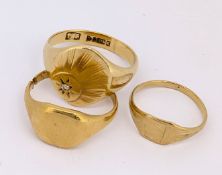 A group of three signet rings, including an 18ct gold signet ring, split shank to side, 4.5gms