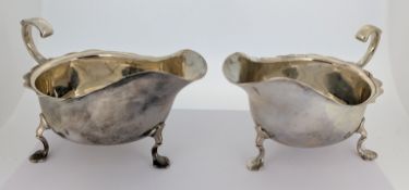 A pair of silver sauce boats, hallmarked Sheffield 1923, total weight approx. 9oz. (2).