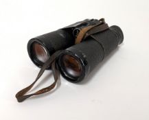 A pair of DDR Carl Zeiss Jena Notarem binoculars, 10 x 40B mc, marked '5257653', with leather