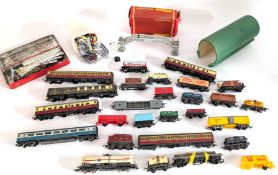 A mixed collection including Tri-ang carriages, Hornby carriages, wagons, accessories etc.