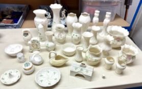 A large collection of Belleek to include Killarney collection, Daisy pattern, Swan creamer,