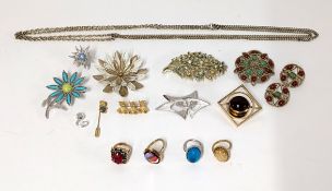 A collection of Sarah Coventry costume jewellery including a brooch with three bears, rings,