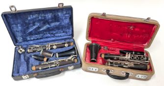 Two clarinets marked B&H, London and Buffet Crampon?, Paris, both cased.