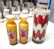 A pair of glass bud vases decorated with Chrysanthemum flowers together with a West Germany vase.