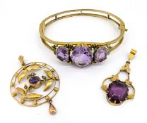 A small group of antique jewellery, including a circular openwork foliate pendant set with