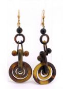 A pair of unusual tortoiseshell drop earrings, circa 1920's, of concentric circle design, (one