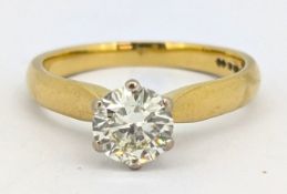 An 18ct gold diamond solitaire, claw set with a brilliant-cut diamond, approx. 0.70 carat,