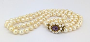 A double row cultured pearl and amethyst necklace, two rows of knotted cultured pearls, pearls