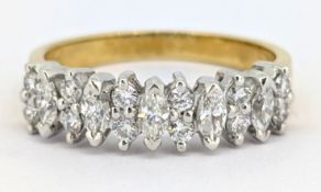 An 18ct gold diamond ring, claw set five marquise-cut diamonds, each interspaced and set to each end
