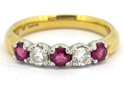 An 18ct gold ruby and diamond five stone ring, claw set with three circular-cut rubies, each