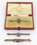 Three Edwardian gem-set brooches, each of varied 'target' design, bi-colour metal and set with