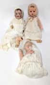 Three dolls including the Simon & Halbig/Kammer & Reinhardt doll (one arm is off and one leg is