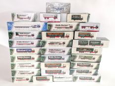 Large collection of Eddie Stobart models, boxed, approx 29 together with Eddie Stobart plates.