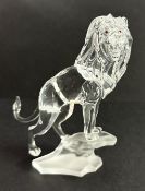 Swarovski Crystal Glass, Lion Standing on Rock, boxed.