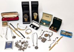 A collection of costume jewellery including wristwatches, cufflinks, necklaces, silver charm