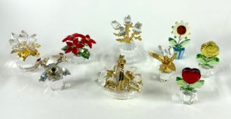 Swarovski Crystal Glass, a collection of mixed flowers including Crystal Memories - Roses, Secrets -