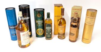 A collection of seven bottles of whiskey to include Bushmills Malt, Glenfiddich Special Reserve