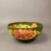 Moorcroft Footed Bowl, Hibiscus pattern on green ground c1960's designed and signed Walter