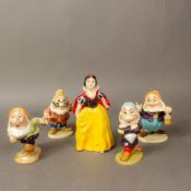 Beswick Character Figurines to include:- Snow White, Doc, Sneezy, Happy, Grumpy. Tallest, from the