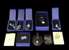 Swarovski selection to include:- Red/Crystal Bee Keyring, Swan Pin, Crystal Ball Keyring, Mobile