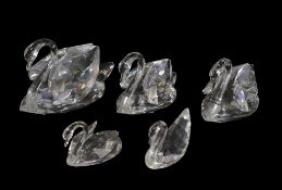 Swarovski group of Five Clear Crystal Swans of various sizes designed by Max Schreck introduced in