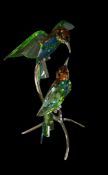 Swarovski Paradise Bee-eaters part of the “Silver Lake” series. The two birds in Peridot crystal are