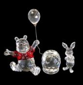 Swarovski Winnie The Pooh Sitting in his Red Top holding his Balloon (905768) together with