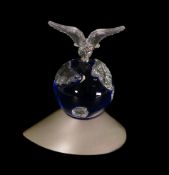 Swarovski crystal Planet was designed to celebrate the new Millennium. It comprises a blue globe