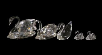 Swarovski group of Five Clear Crystal Swans of various sizes designed by Max Schreck introduced in