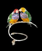 Swarovski pair of Gouldian Finches vibrant colours of Peridot and Violet crystal. The birds perch on