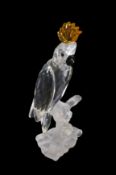 Swarovski Crystal small Cockatoo with yellow crest on frosted branch, by Heinz Tabertshofer, with