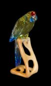 Swarovski Crystal Paradise Green Rosella figurine, mounted on wooden perch, designed by Heinz