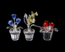 Swarovski Crystal Red Primula Rhodium together with Blue Forget Me Not flowers and Daffodil, with