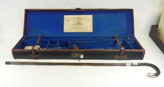 Vintage gun case to hold a disassembled shotgun, together with a walking stick with crook handle and