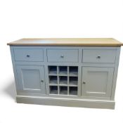 Modern oak 3 drawer sideboard, with 2 lower cupboards and central inbuilt wine rack. Painted grey