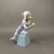 Lladró Harlequin clown figurine. (H: 20.5cm)