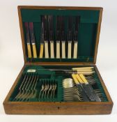 43 piece set of Cutlery 'Taylors Witness Sheffield' presented in a oak box with green felt lining(