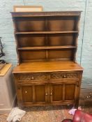 Early 20th-century oak dresser with plate rack above, 2 doors and 2 drawers to the sideboard base, W