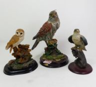 Three resin sculptures of birds of prey, including Juliana Collection, Leonardo and House of