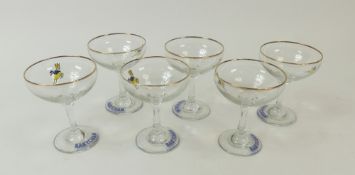 A set of six mid-20th century promotional Babycham coupe glasses with gilt rims and enamelled fawn