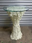 Modern composite pedestal table with entwined rose decoration in a pale green finish and a