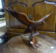 Large carved teak eagle, wingspan 68cm.
