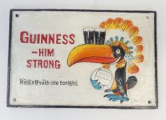 Guinness, Him Strong, cast iron advertising sign. (H: 20cm x L: 30.5cm)