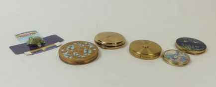 A collection of decorative enamel and gold tone powder compacts from Stratton and Skol amongst