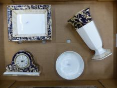 Wedgwood Cornucopia pattern items to include a mantle clock, vase, rectangular dish, etc (1 tray).