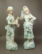 Two large Continental figures depicting a male musician and a female dancer, height 49cm (2).